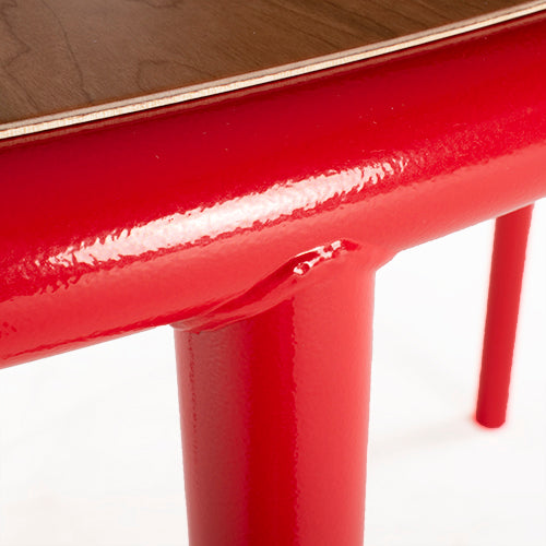 Muller van Severen wooden table rood